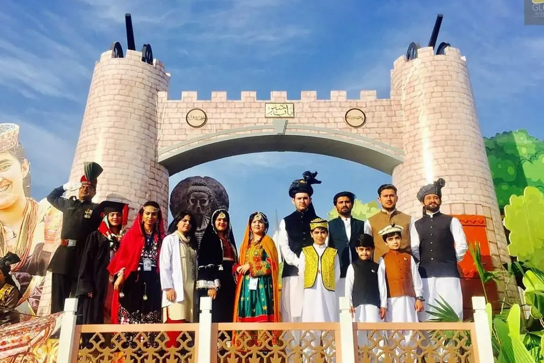 Group of people wearing kpk traditional dresses
